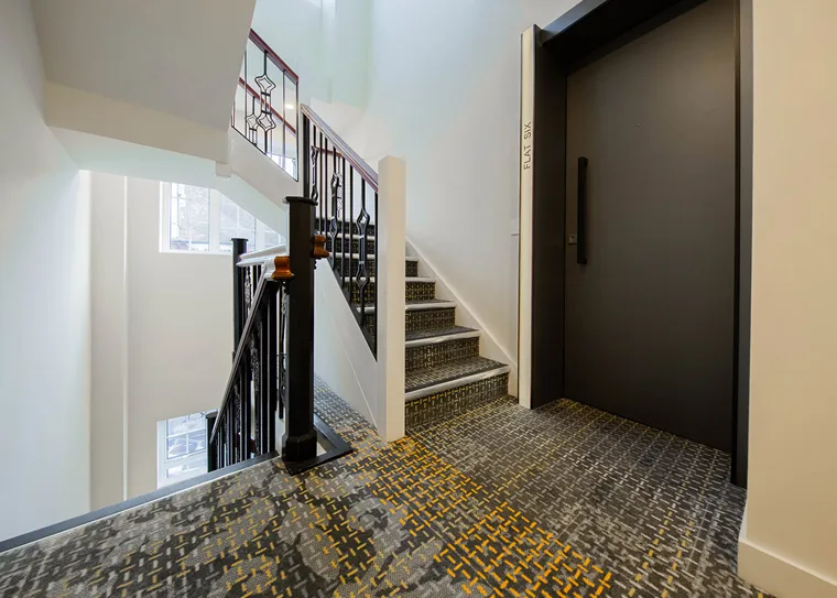 Entrance hallway and staircase at Brent Street Residence